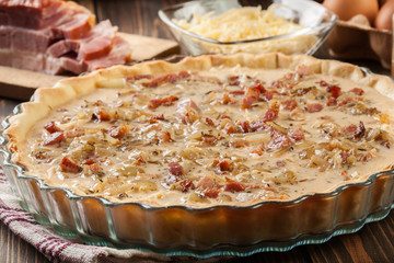 Making stuffing while preparing a traditional quiche