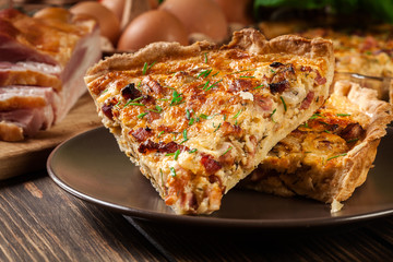 Pieces of quiche lorraine with bacon and cheese