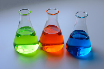 Three solution flasks in laboratory