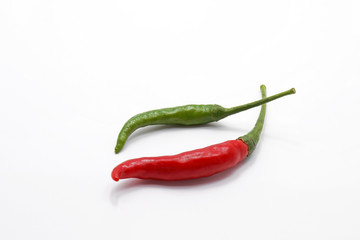 Red and Green Chili Spur Pepper on White Background