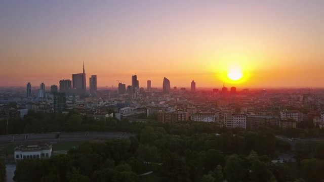 milan skyline at sunrise aerial view sun rising