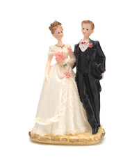 Bride and groom, old cake topper on white background