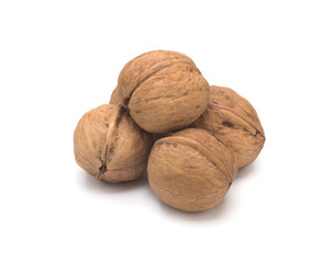 Walnuts in shell on a white background.