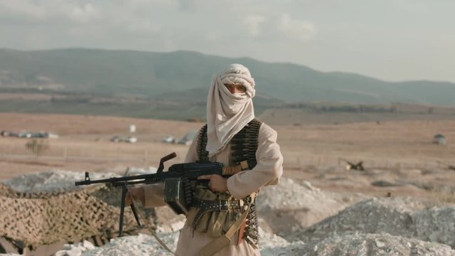 Armed man in the field
