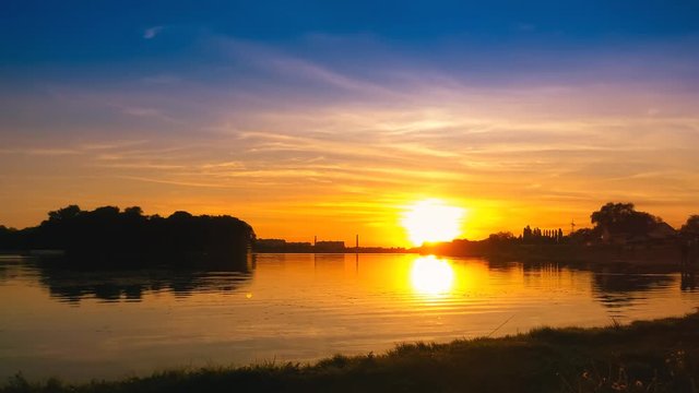 Time lapse of the sunset on Southern Bug river in Khmelnytskyi city, Ukraine