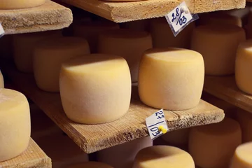 Papier Peint photo Lavable Produits laitiers Cheese factory production shelves with aging cheese