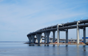 curved viaduct with the highway above the sea surface
