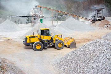 Quarry aggregate with heavy duty machinery