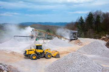 Quarry aggregate with heavy duty machinery