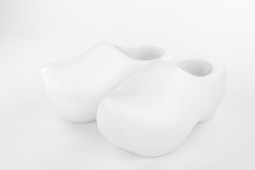 Wooden shoes in a high key recording.