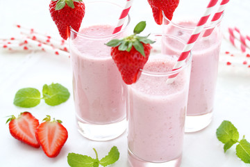 Delicious strawberry smoothie with fresh strawberry in a glass.Selective focus. いちごのスムージー