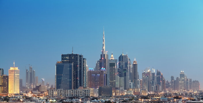 Dubai city downtown at dusk, United Arab Emirates.