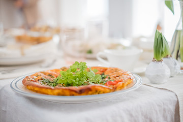 Fritatta with tomatoes and fresh herbs