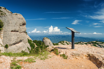 Sunny view of mountains of Santa Maria de Montserrat Abbey in Monistrol de Montserrat, Catalonia,...