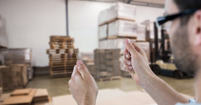 Man photographing goods through device  - Powered by Adobe