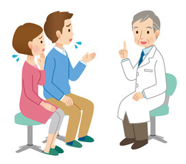 医師に相談する夫婦　不妊治療