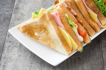 Club sandwich on wooden table 
