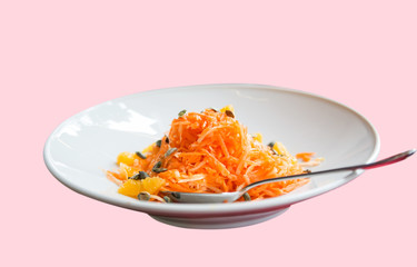 Carrot salad in a white plate