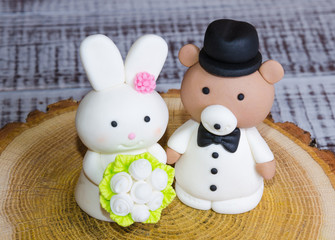 two-tier fondant wedding lace cake with bear and bunny