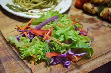 Mix salad on wooden board