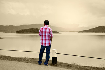 A lone man standing on the lake.beautiful view