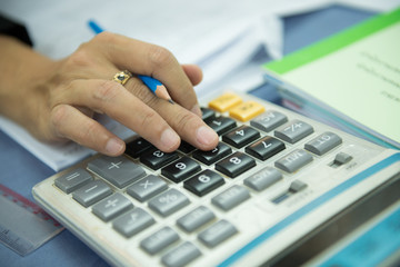 Business woman working with tax documents