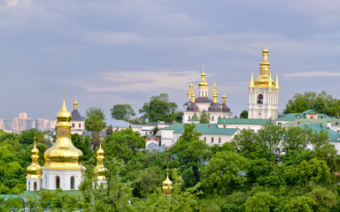 Fototapeta na wymiar Ukraine. Kiev Pechersk Lavra that is known as the Kiev Monastery of the Caves. The church of the Nativity of the Most Holy Mother of God, the monks’ cells and the pathway to the Far Caves.