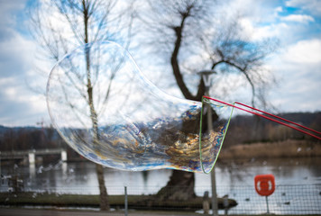  Big soap bubble flying. Bubble show outdoors