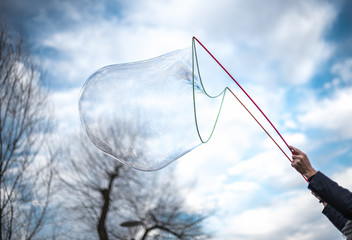  Big soap bubble flying. Bubble show outdoors