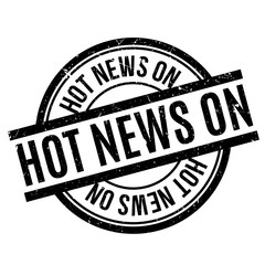 Hot News On rubber stamp. Grunge design with dust scratches. Effects can be easily removed for a clean, crisp look. Color is easily changed.