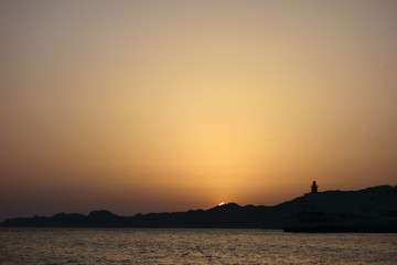 Sunset lighthouse silhuette