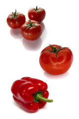 Tomatoes and peppers isolated on white background