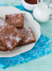  Chocolate Brownie on wooden surface