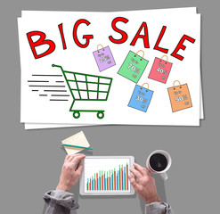 Big sale concept placed on a desk