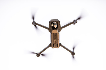 Quadrocopters with camera during flight in the sky