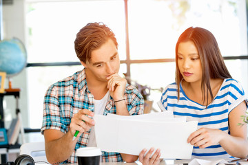 Fototapeta premium Two office workers at the desk