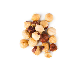 Pile of roasted hazelnuts close-up isolated on white background