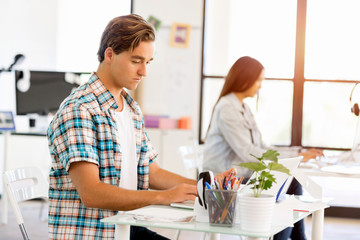 Young man working in office