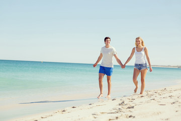 Romantic young couple on the beach