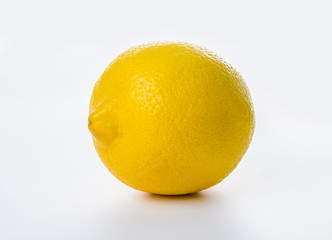 Yellow lemon on a white background.