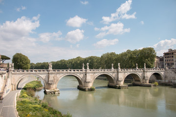 Fototapeta na wymiar View at bridge Ponte Sant Angelo in Rome