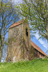 Tower of the medieval church in Oostum