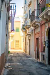 Fototapeta na wymiar Charming street of Gallipoli, Italy