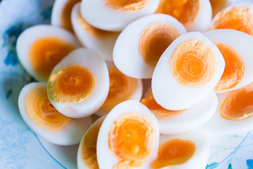 Many eggs cooked to boil cooked to put together as food.