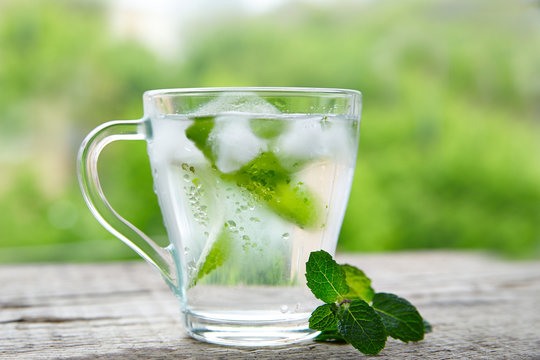 Cold drink with mint in a glass