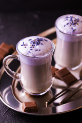 Cappuccino with lavender and chocolate syrup and flowers