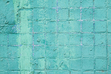 Shabby tile blue color. Texture of peeling tiles