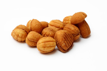 homemade cookies, nuts with condensed milk on white background