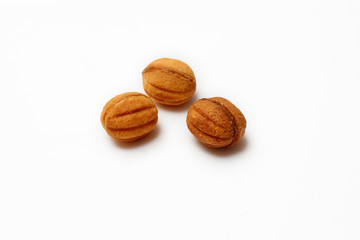 homemade cookies, nuts with condensed milk on white background