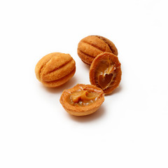 homemade cookies, nuts with condensed milk on white background